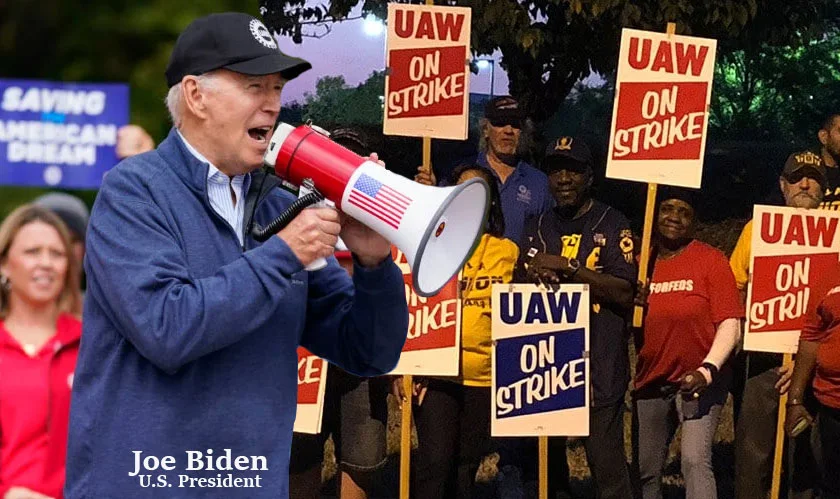 Biden joins UAW picket line